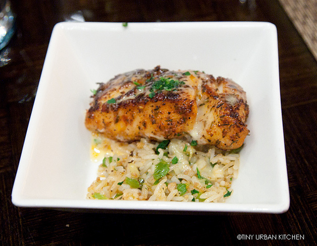 pan seared fish over herbed rice