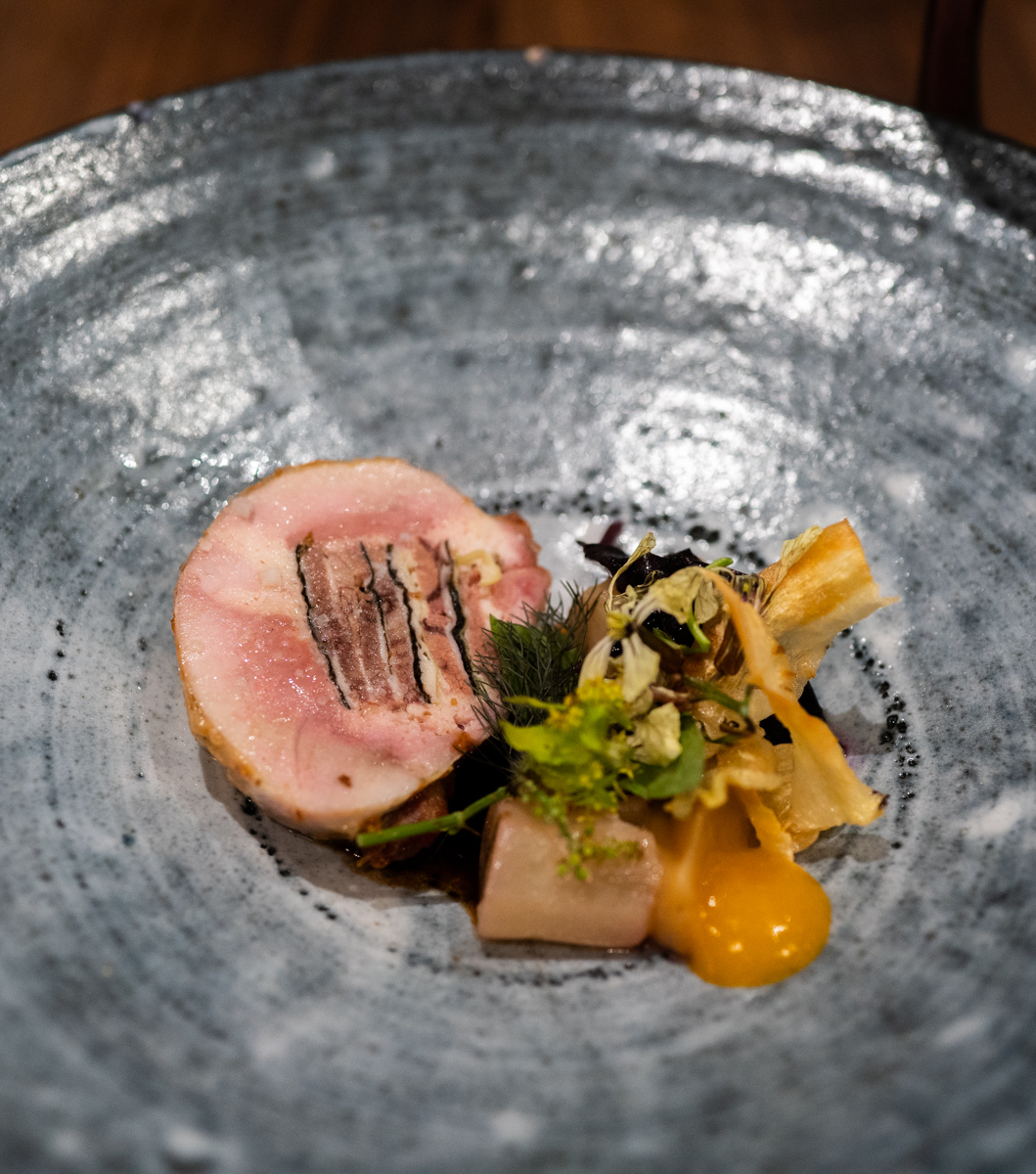 pigeon filled with veal + nori, lobster sauce, salsify, parsnip purée, chips,  kumquat?